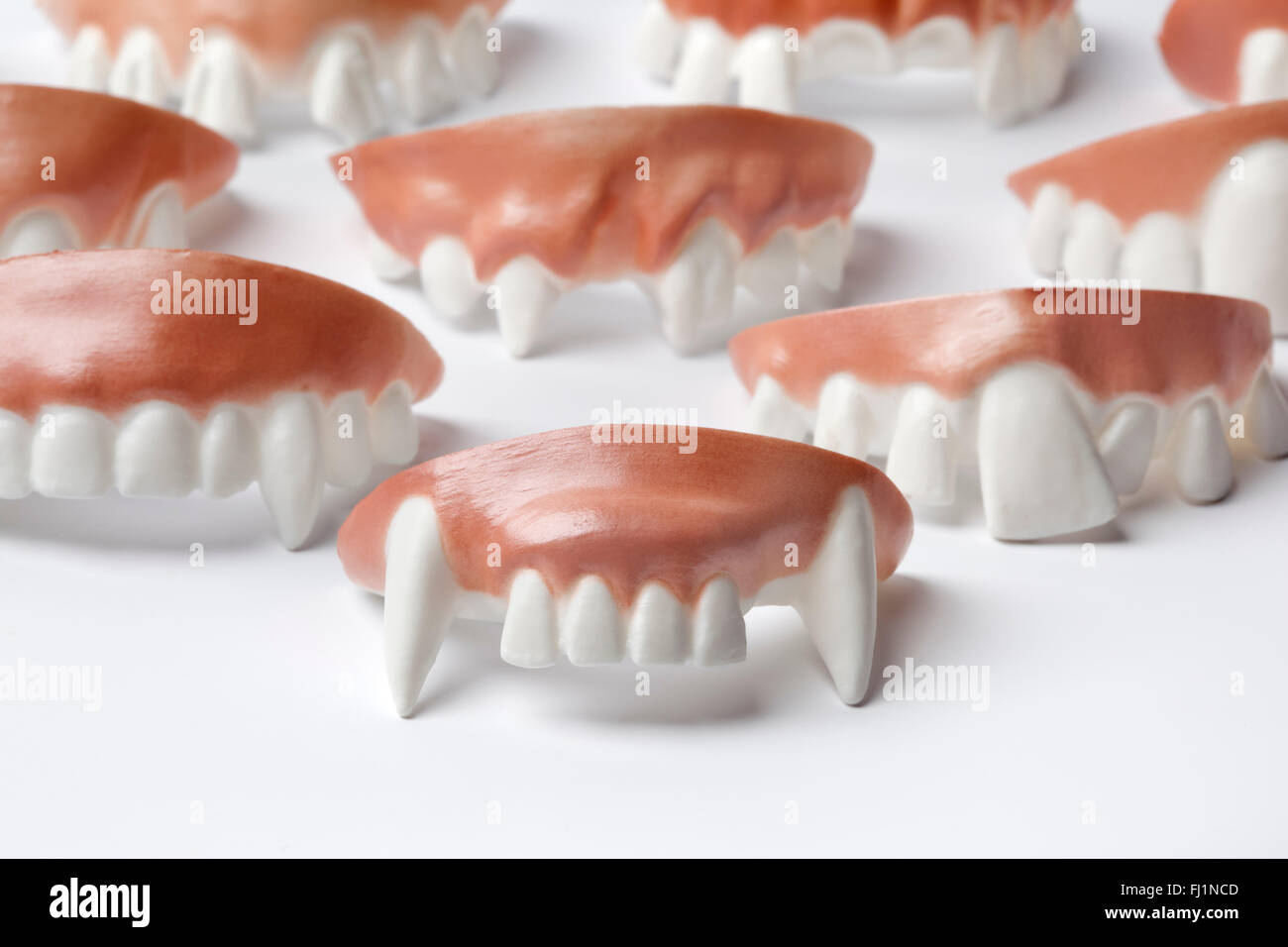 Boy Wearing Fake Vampire Teeth With Fangs High-Res Stock Photo