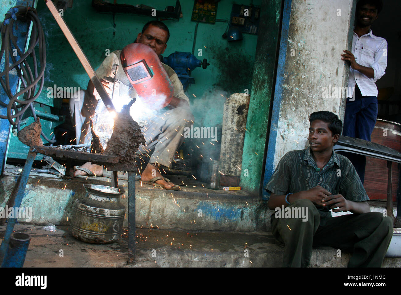 Welder solderer at work in Chennai, India Stock Photo