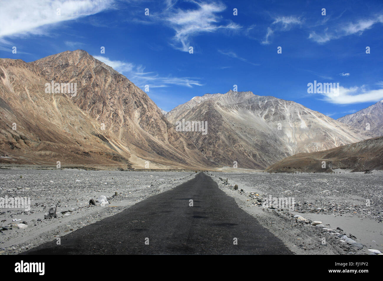 empty road in Himalayas in Nubra valley, Ladakh, India Stock Photo