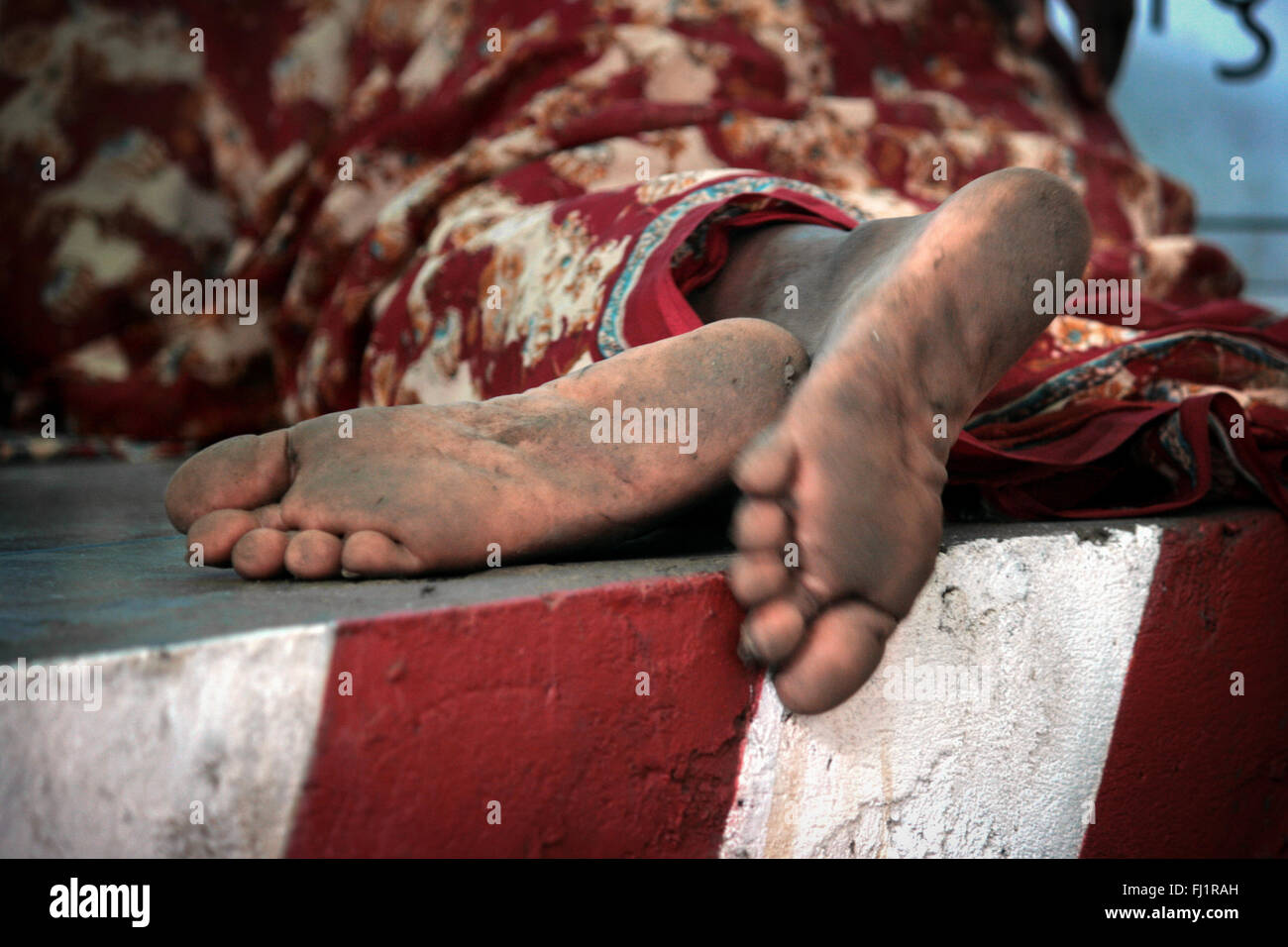 Dirty feet of begger, Mumbai, india Stock Photo