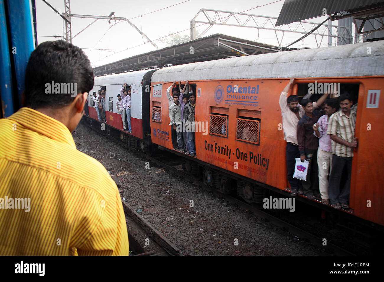 People passengers inside suburban train in Mumbai Bombay, India Stock Photo