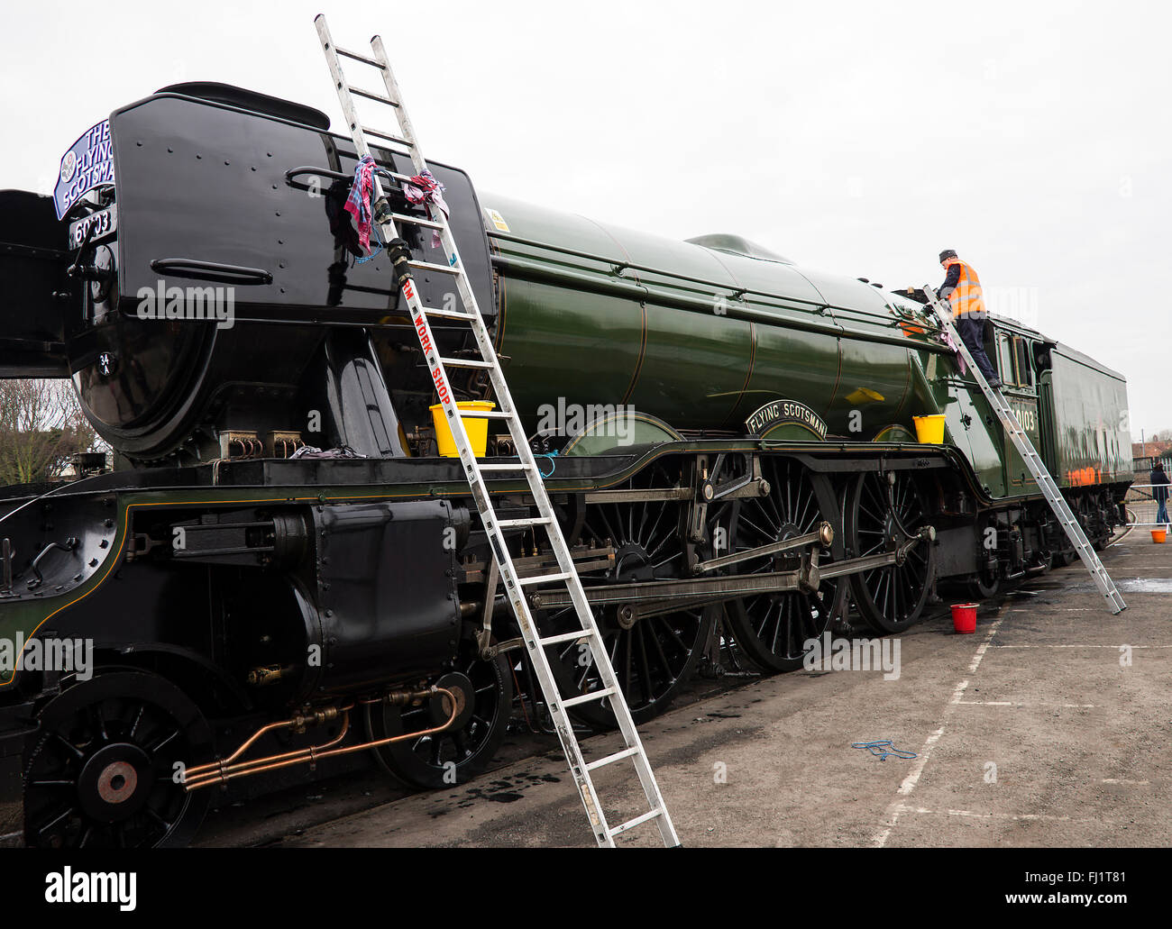 The A3 Steam Engine Flying Scotsman at The National Railway Museum in York Being Cleaned After a Journey from London Stock Photo
