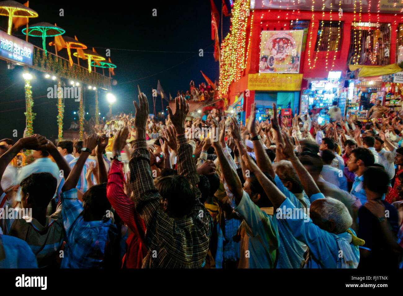 Crowd during ceremony at night on Dashashwamedh Ghat , Varanasi, India Stock Photo