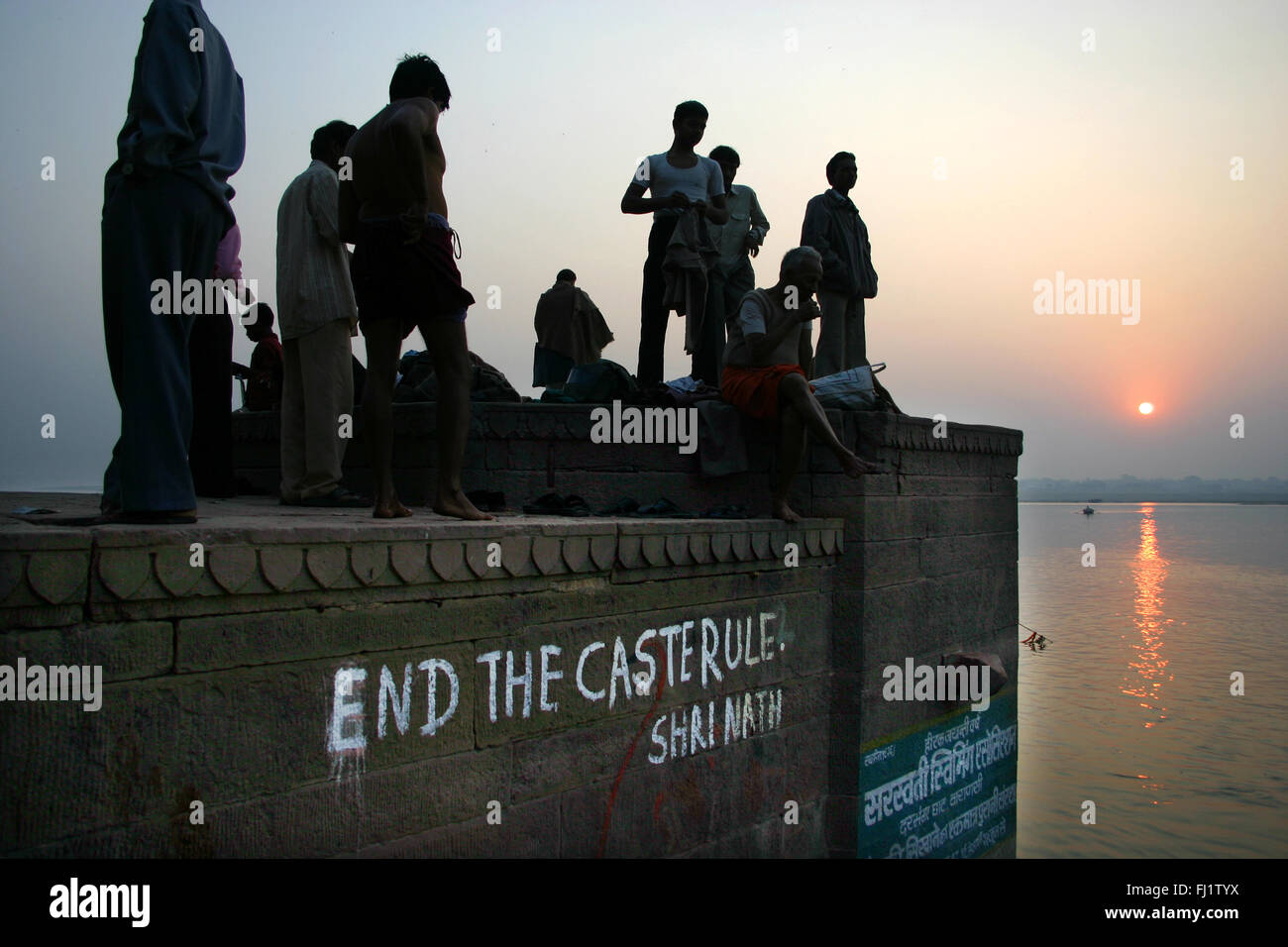 Crowd on ghat of Varanasi by sunrise, India Stock Photo
