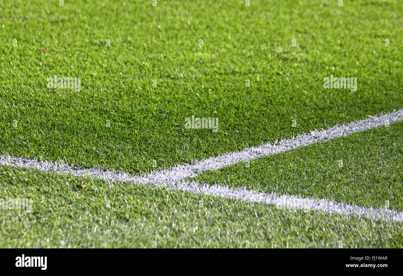 White stripes on the green soccer field Stock Photo