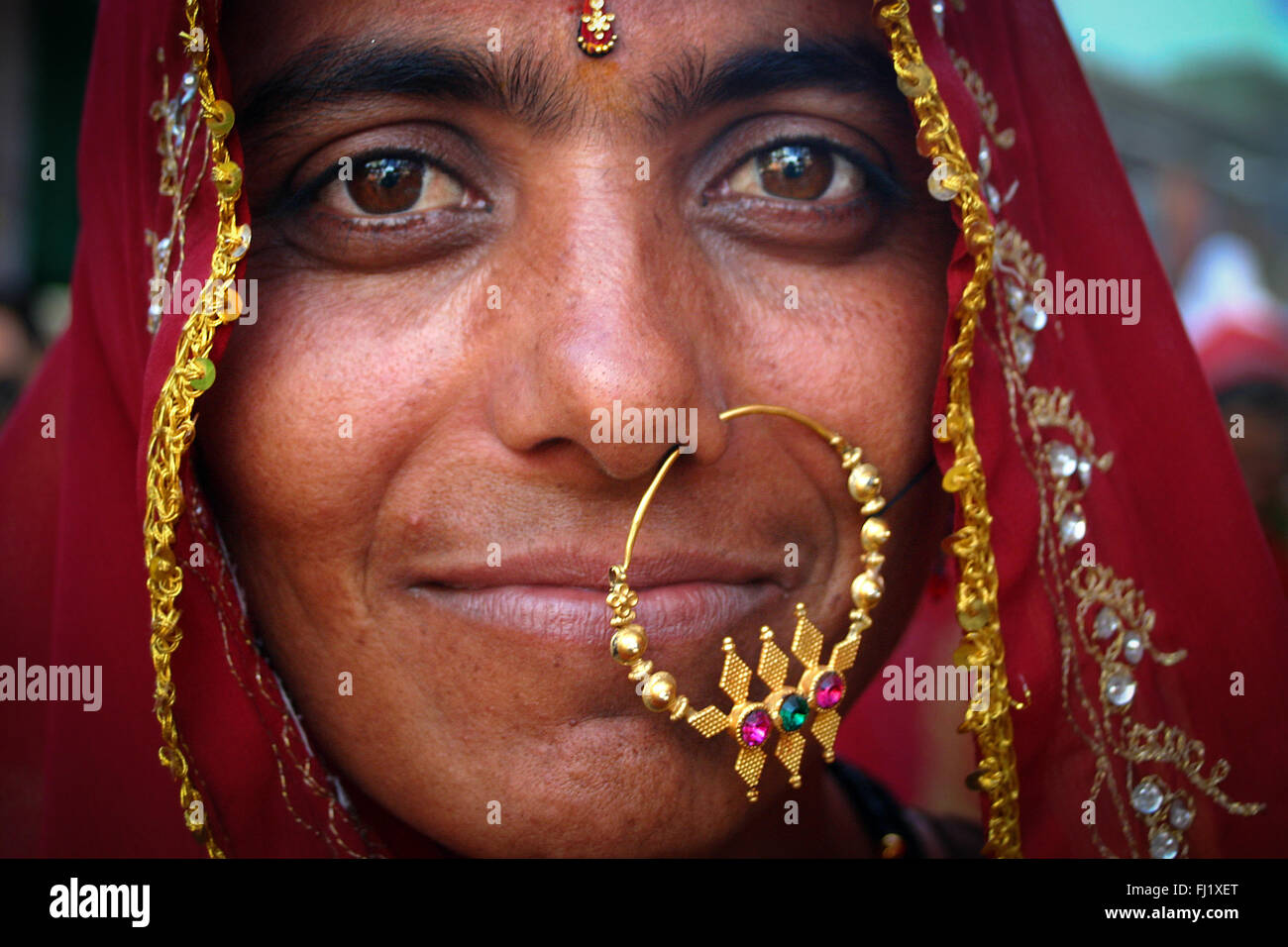 Portrait of Indian hindu woman with huge nose ring jewel during Pushkar  mela- Pushkar camel fair in Rajasthan, India Stock Photo - Alamy