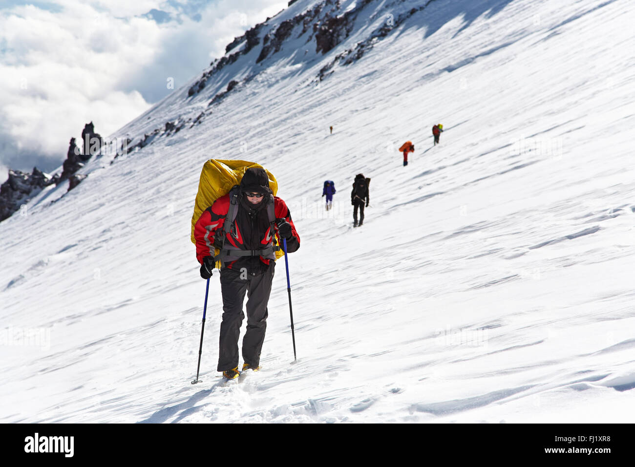 Group of hikers in the mountain Stock Photo - Alamy