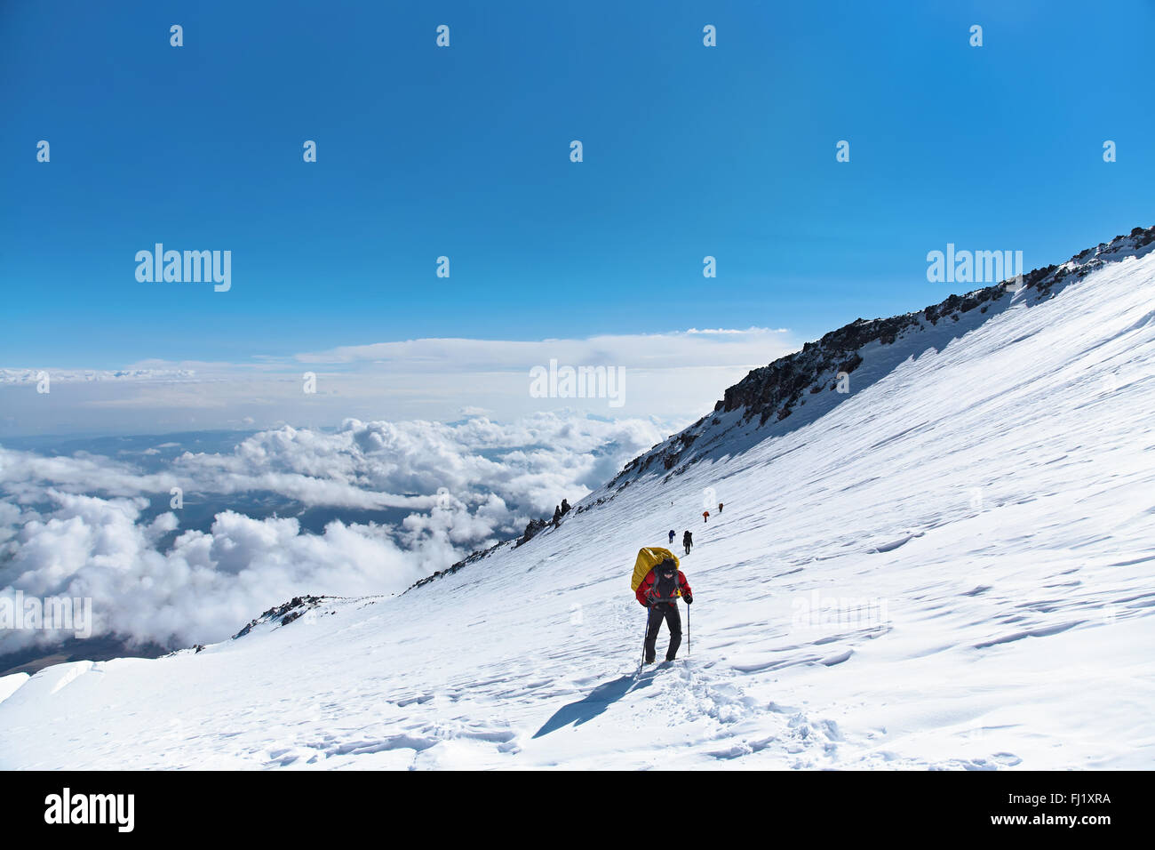 Group of hikers in the mountain Stock Photo - Alamy