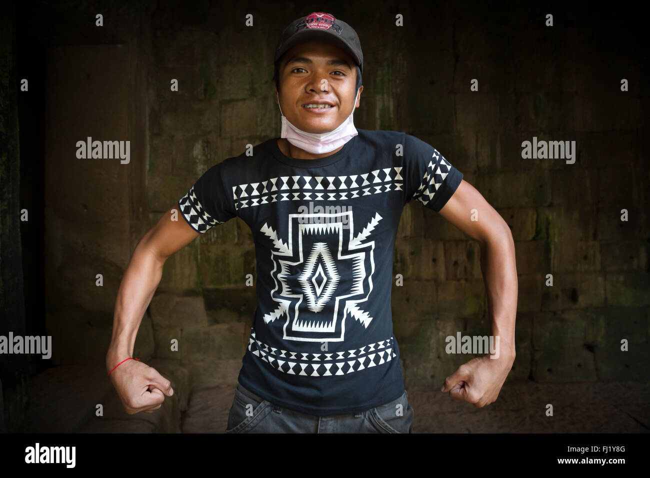 Funny Cambodian man inside Angkot Vat, Siem Reap Stock Photo
