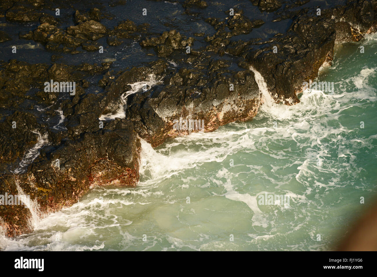 Rocks and water in Oahu, Hawaii Stock Photo Alamy