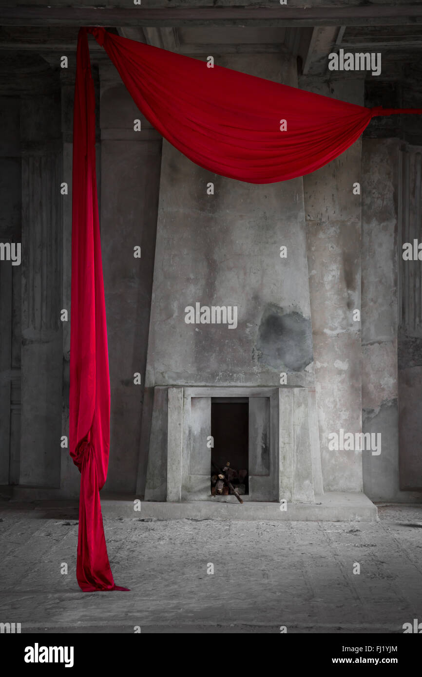 Red veil and chimney inside old abandoned Bokor casino, Kampot, Cambodia Stock Photo