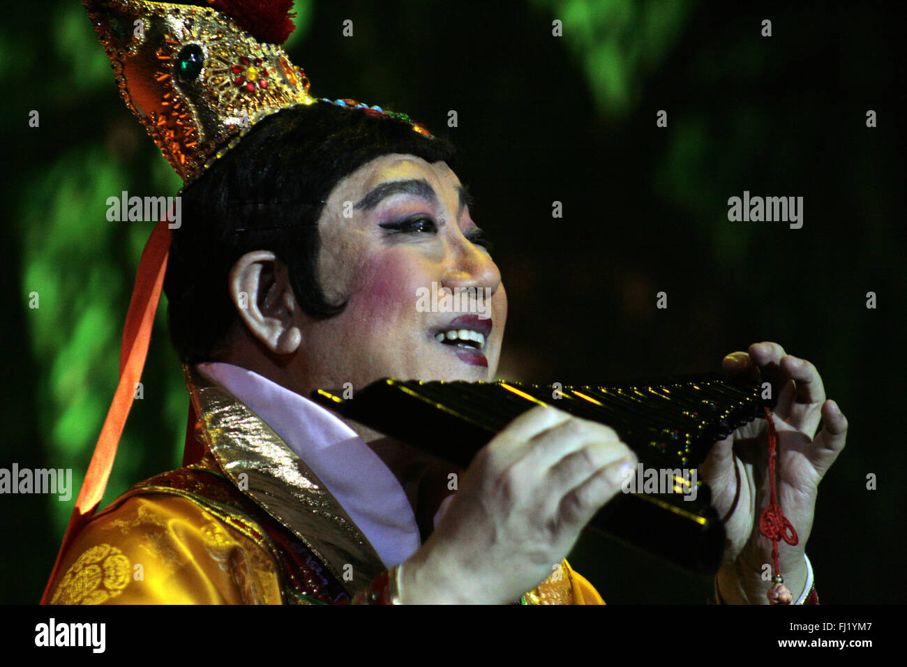 Musician playing flute during a traditional Tang dynasty Chinese opera Stock Photo