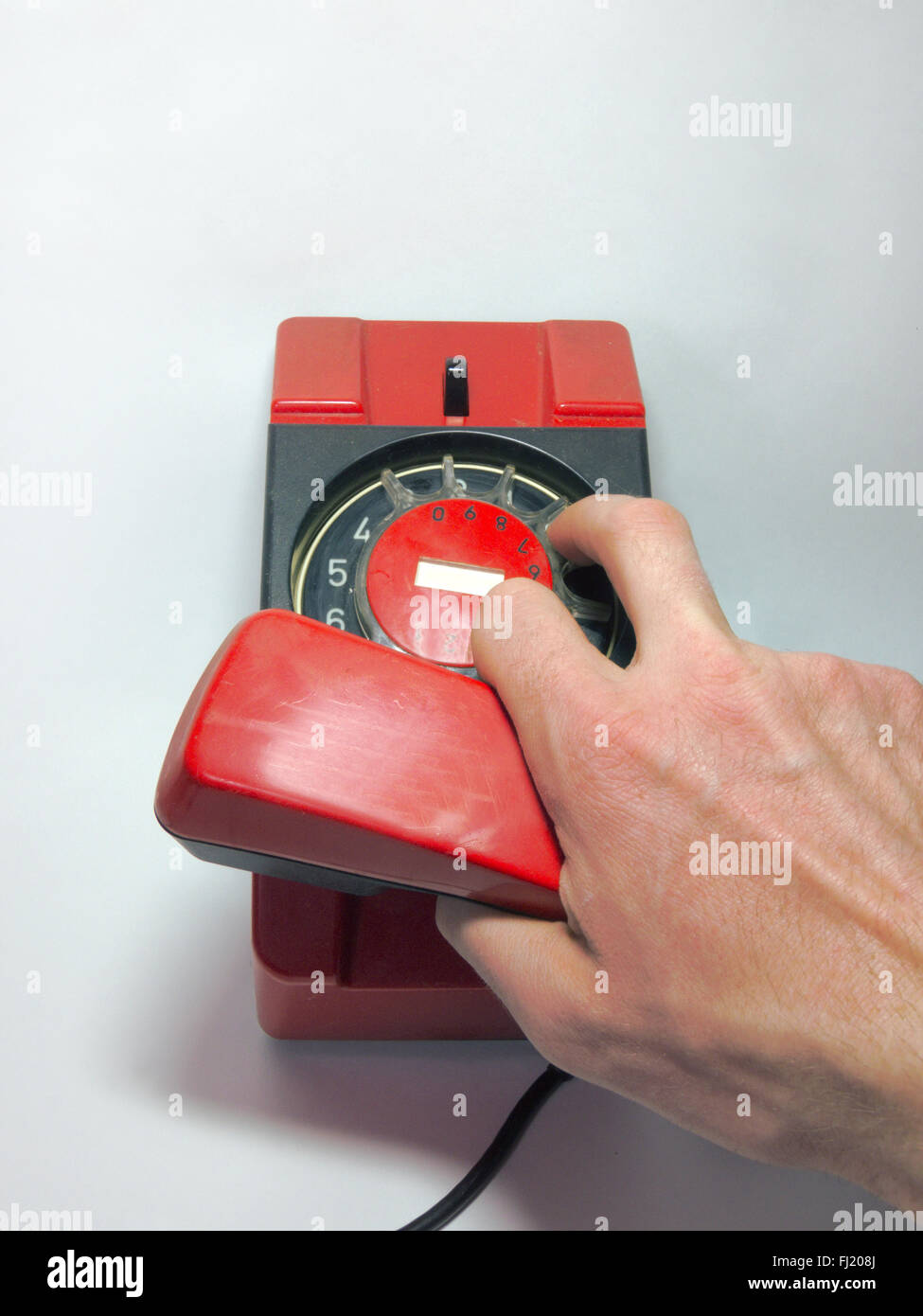 Dial the number on the old disk phone Stock Photo Alamy