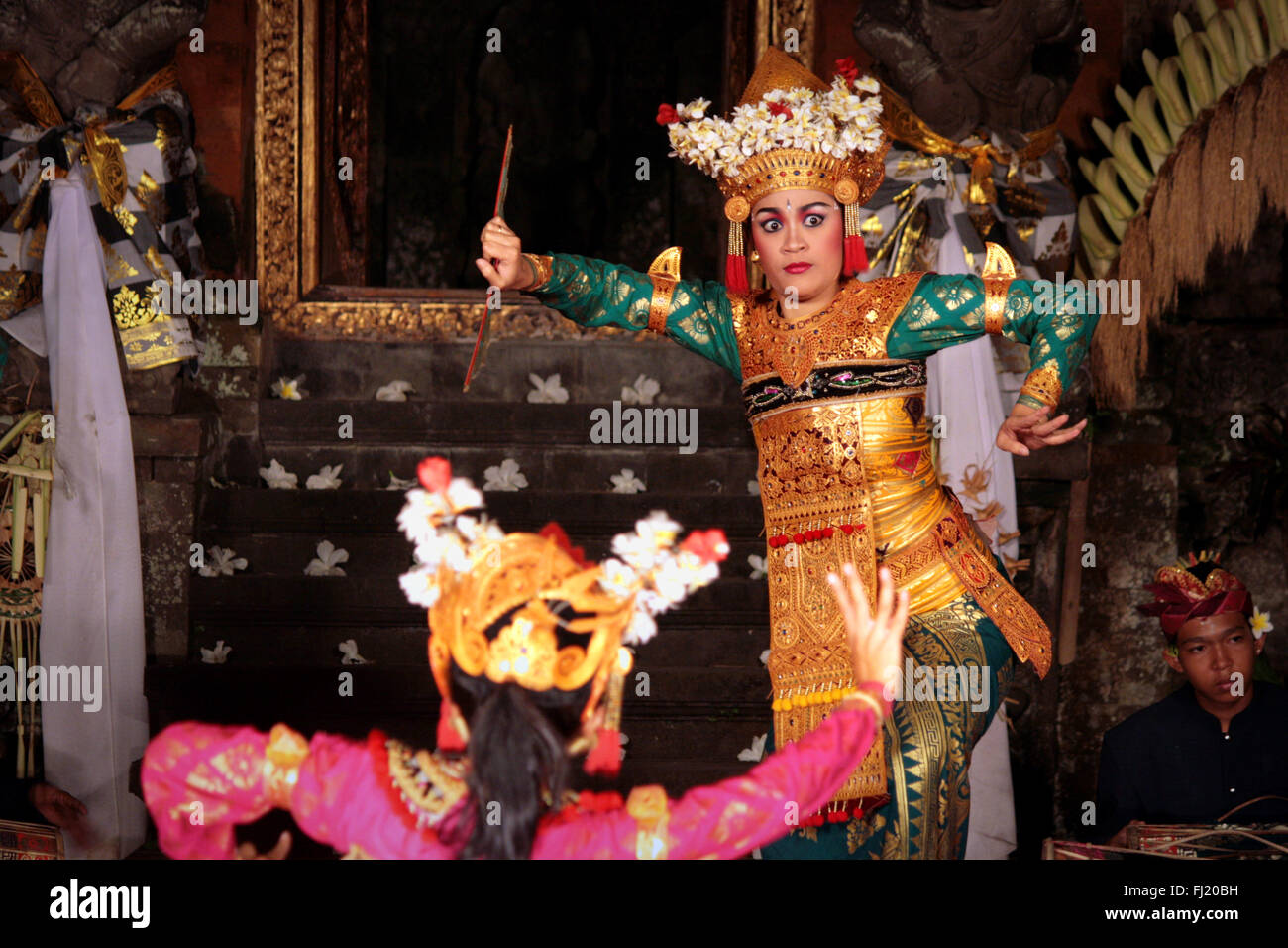 A barong dance performance at outdoor theater at night in Ubud, Bali, Indonesia Stock Photo