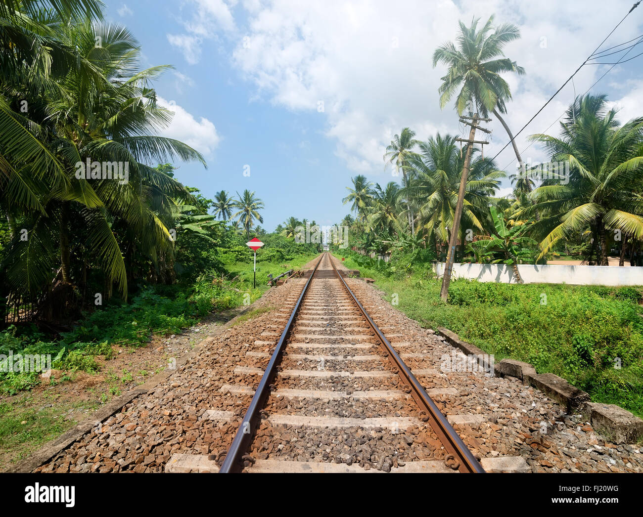 Sign near railroad in jungles of Sri Lanka Stock Photo