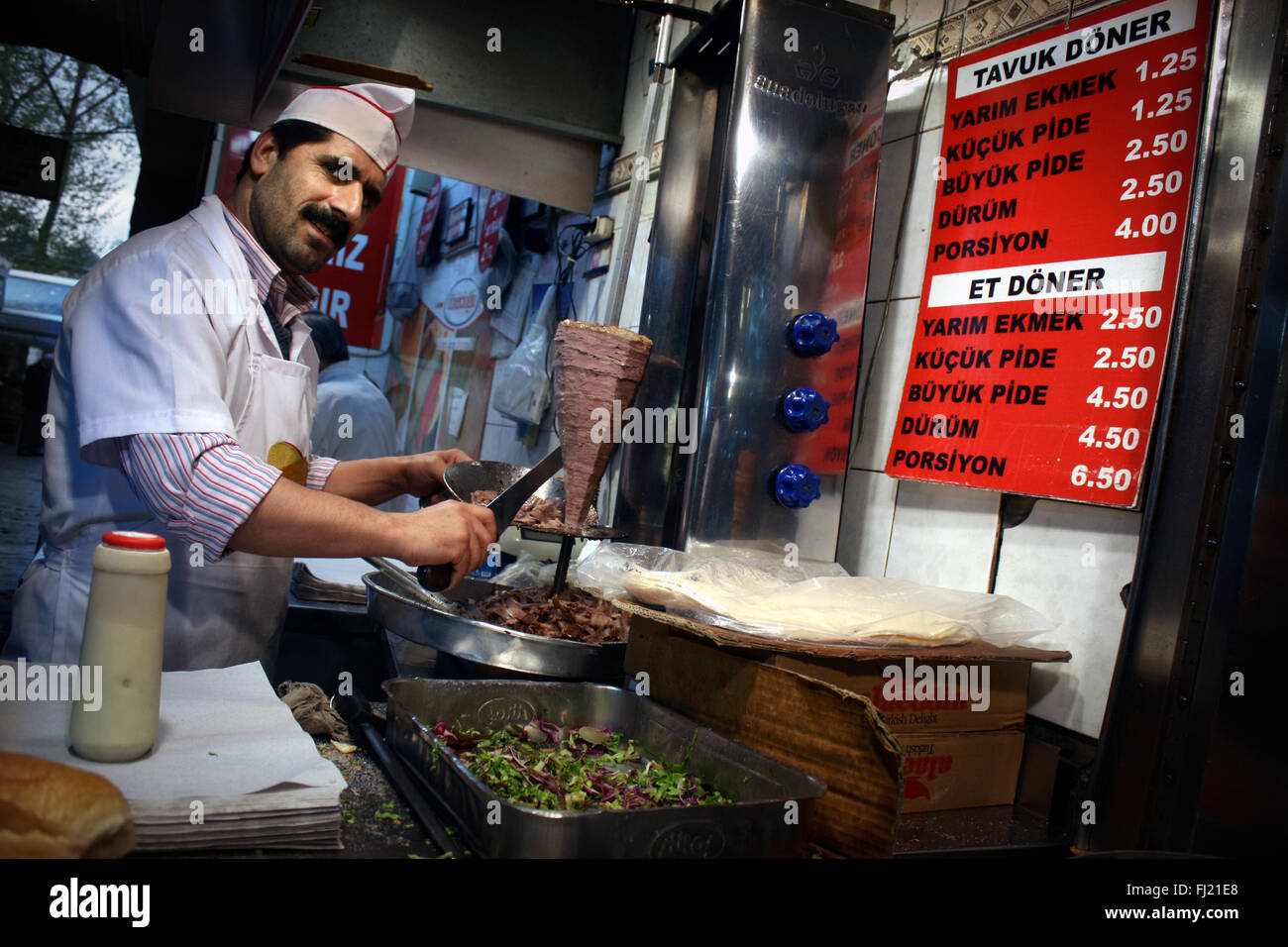 Turkish man preparing traditional kebab  in Spice bazaar , Istanbul Stock Photo