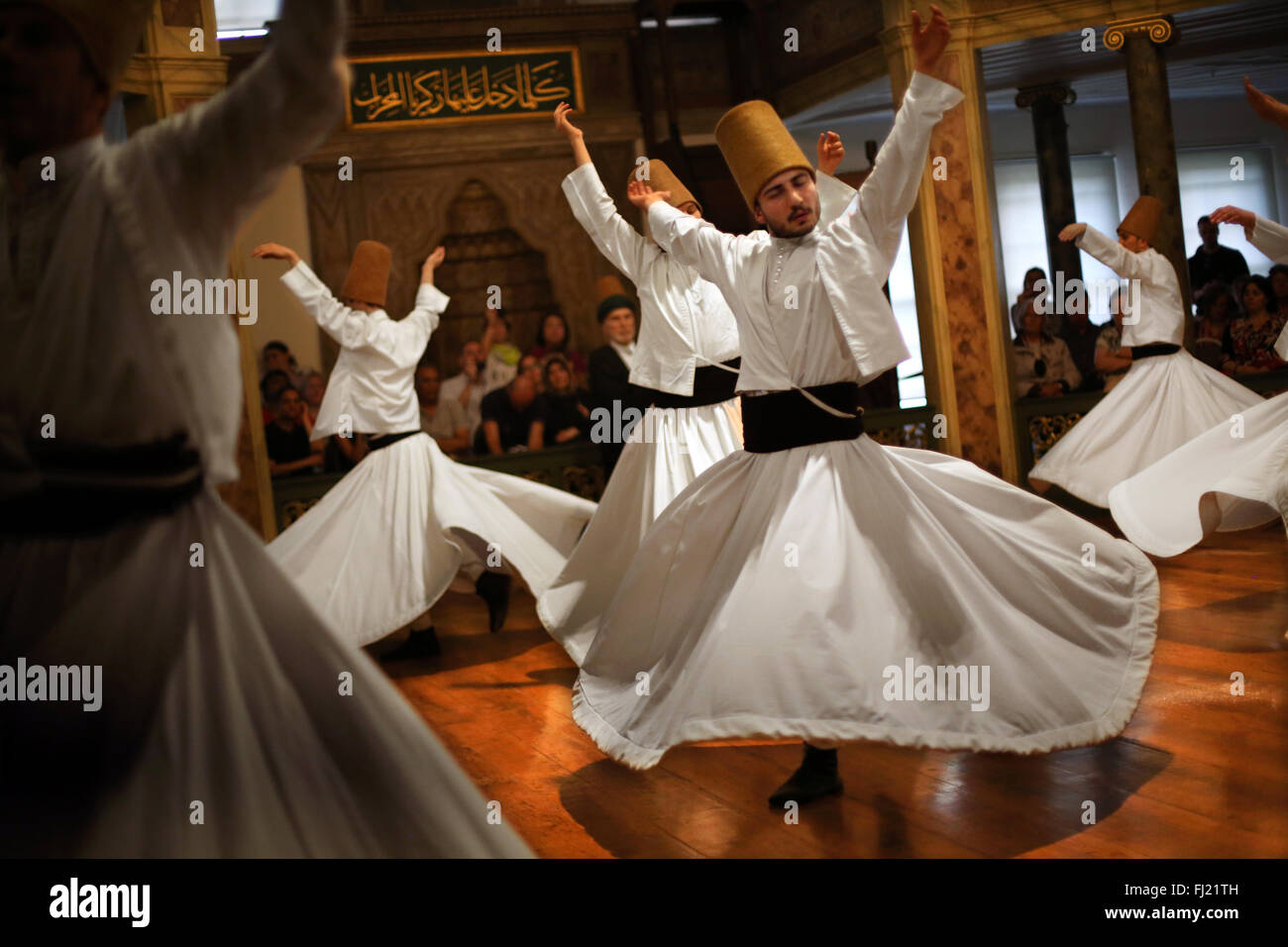 Whirling Dervishes perform at Hodjapasha Culture Centre, Istanbul Stock Photo