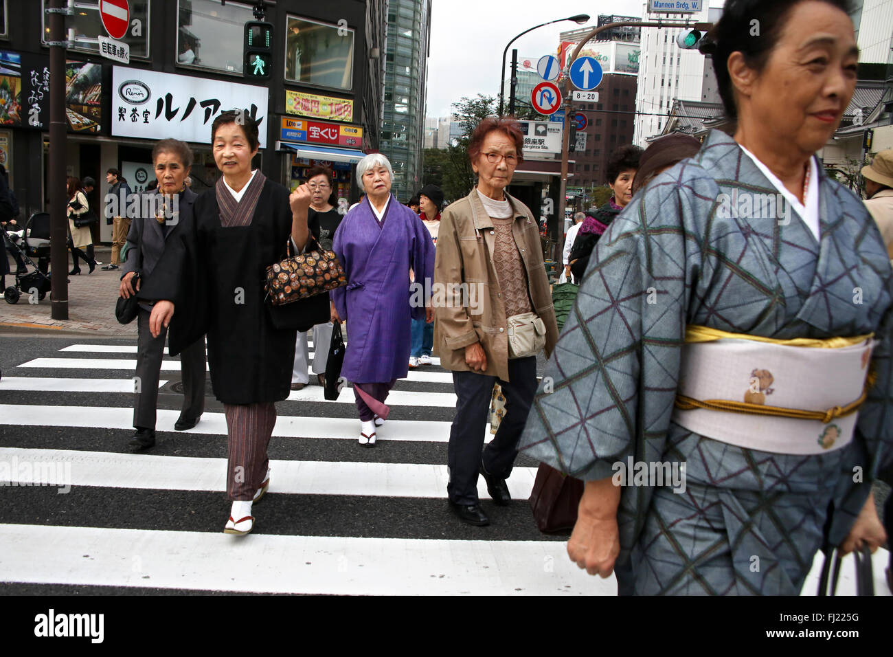 People in a street of Tokyo, Japan Stock Photo