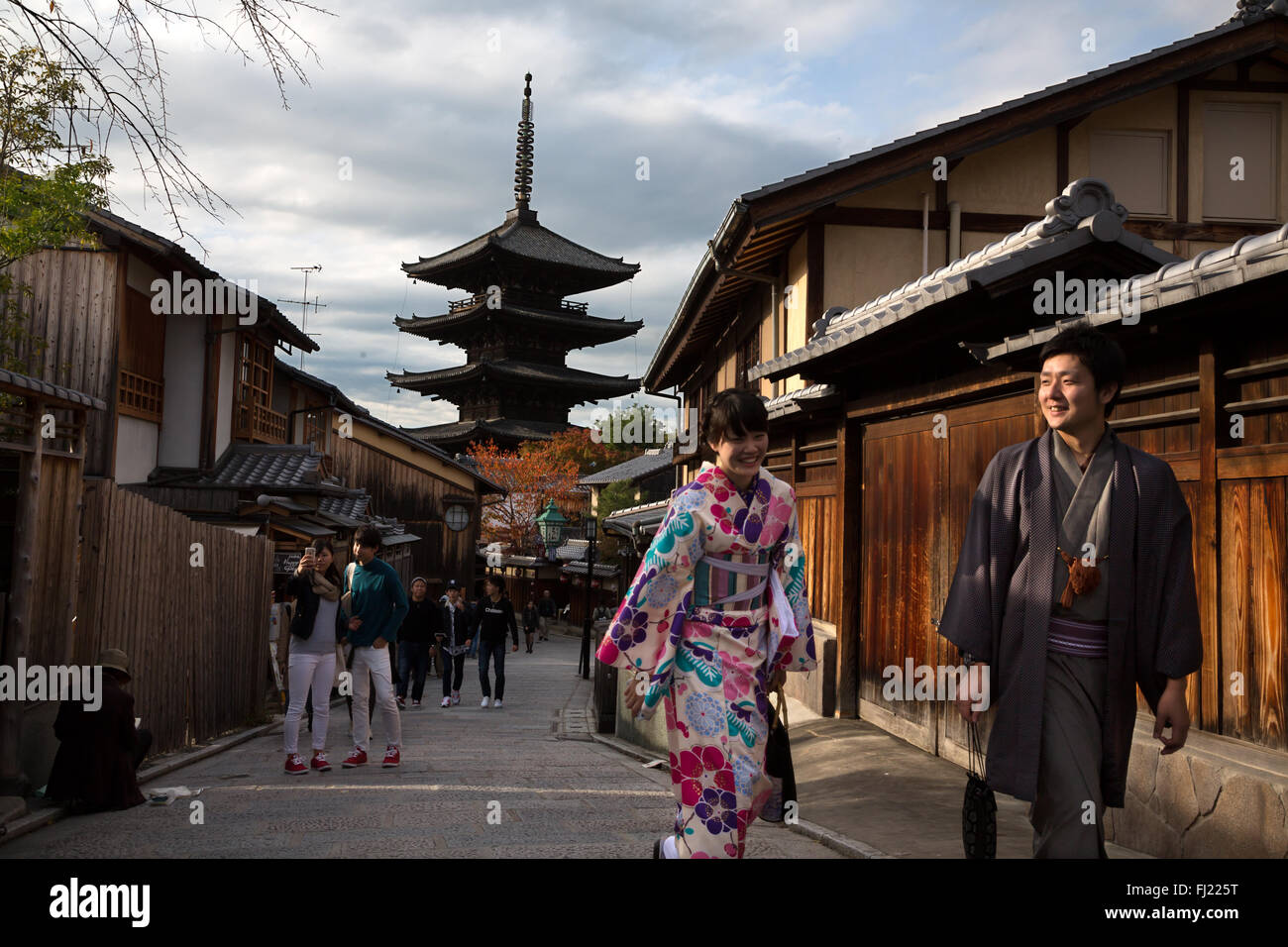 Couple of lovers with kimono walk in the streets of Kyoto , Japan Stock Photo