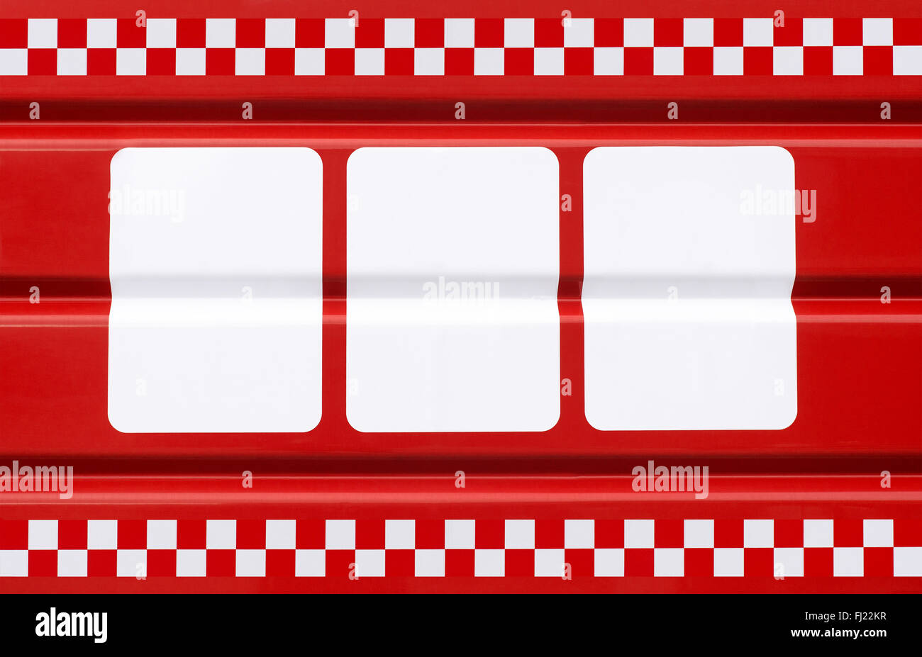 red metal plate with three white rectangles for symbols Stock Photo