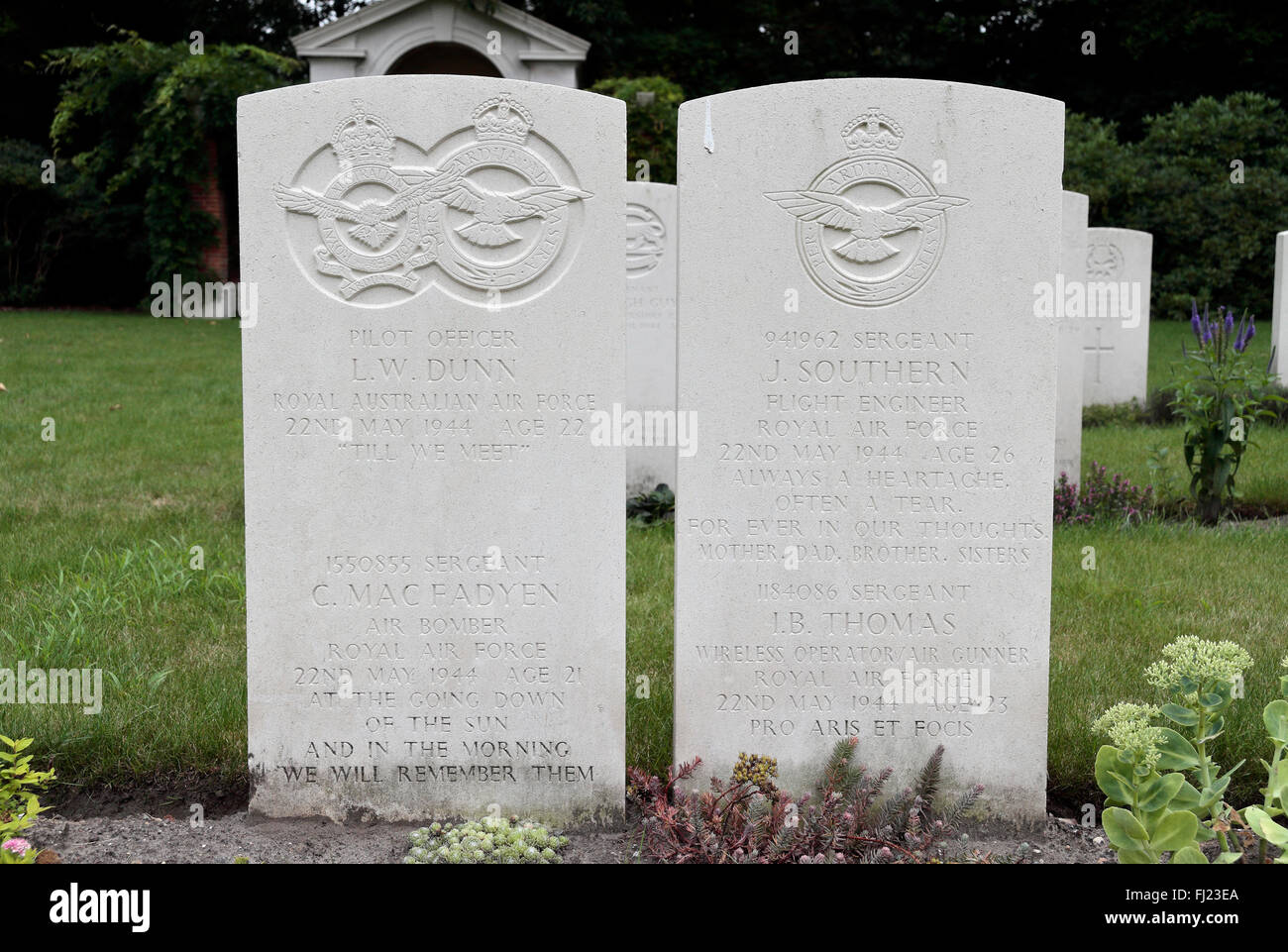 Combined graves of the crew of a single plane in the CWGC Leopoldsburg War Cemetery, Limburg, Belgium. Stock Photo