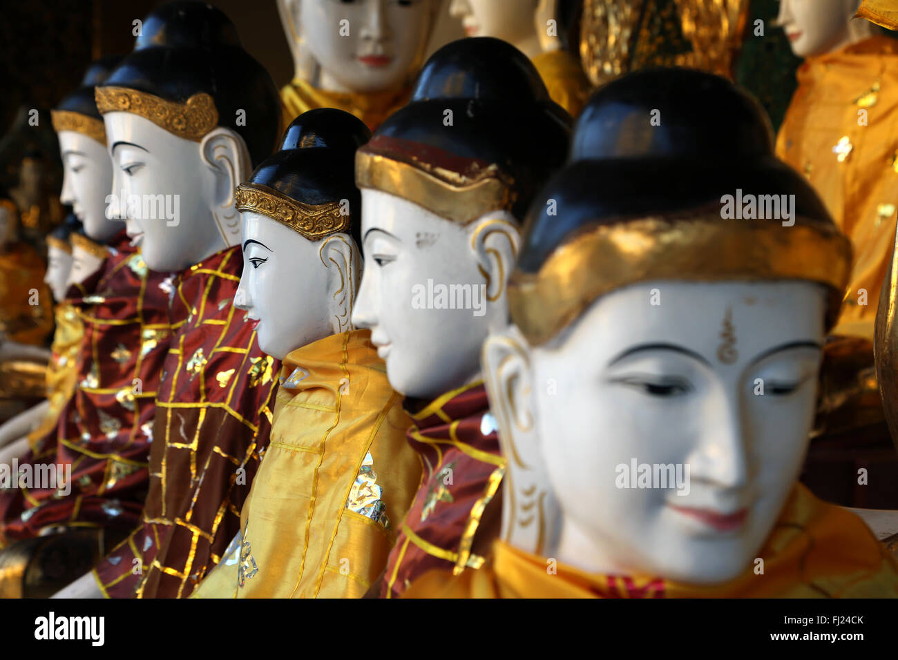 Buddha statues inside Shwedagon Pagoda, Yangon , Myanmar Stock Photo