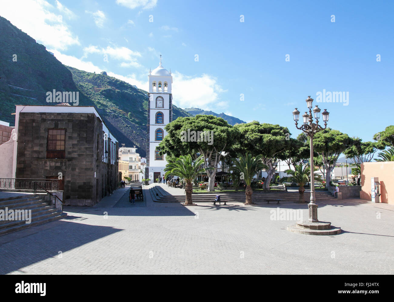 GARACHICO, SPAIN - JANUARY 20, 2016: View on the center and the church of Santa Ana in Garachico, Tenerife, Canary Islands, Spai Stock Photo
