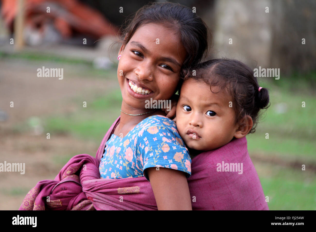 Portrait of Nepali girl with her sister in Pokhara Stock Photo