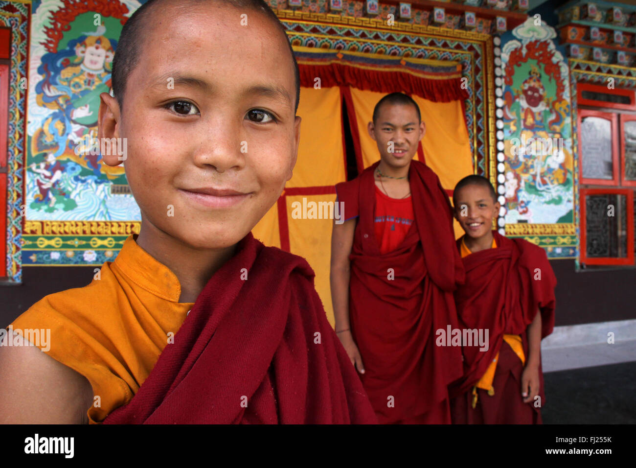 Portrait of Nepali monks novice at gompa in Boudhanath Stock Photo