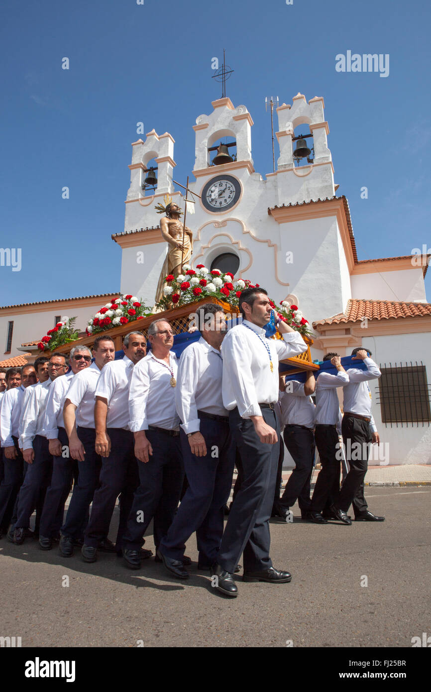 ALMENDRALEJO, SPAIN, APRIL 6: Costaleros carriying a float during the last Holy Week Procession or Resurrection Day, Spain, Alme Stock Photo