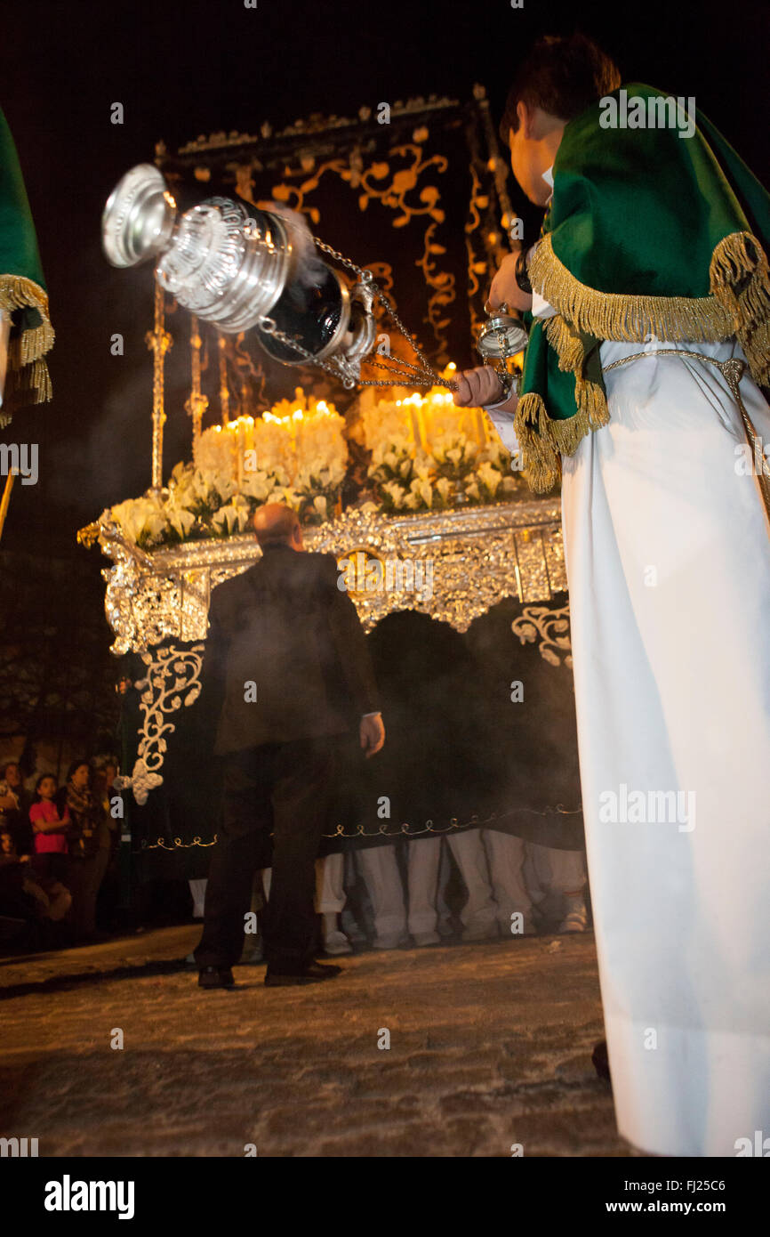 Altar boy with silver censer to burn incense hires stock photography
