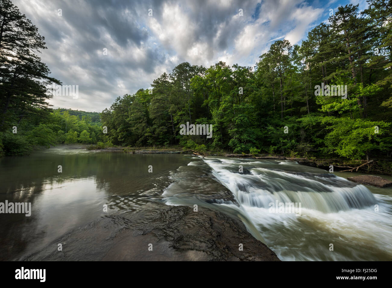 Waterfall in the Ozark National Forest under cloudy skies. Stock Photo
