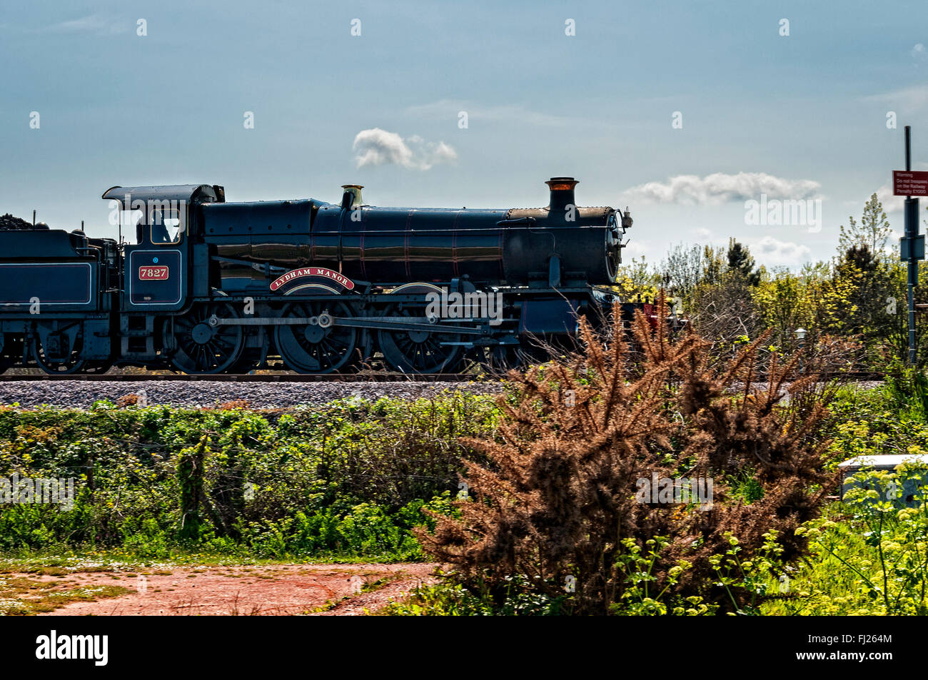 Great Western Railway 7800 Manor Class No. 7827 Lydham Manor, steams slowly into Goodrington