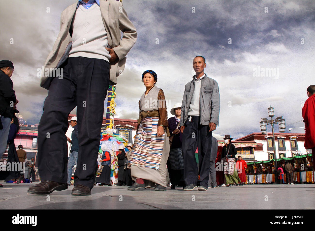 people praying in Lhasa, Tibet Stock Photo