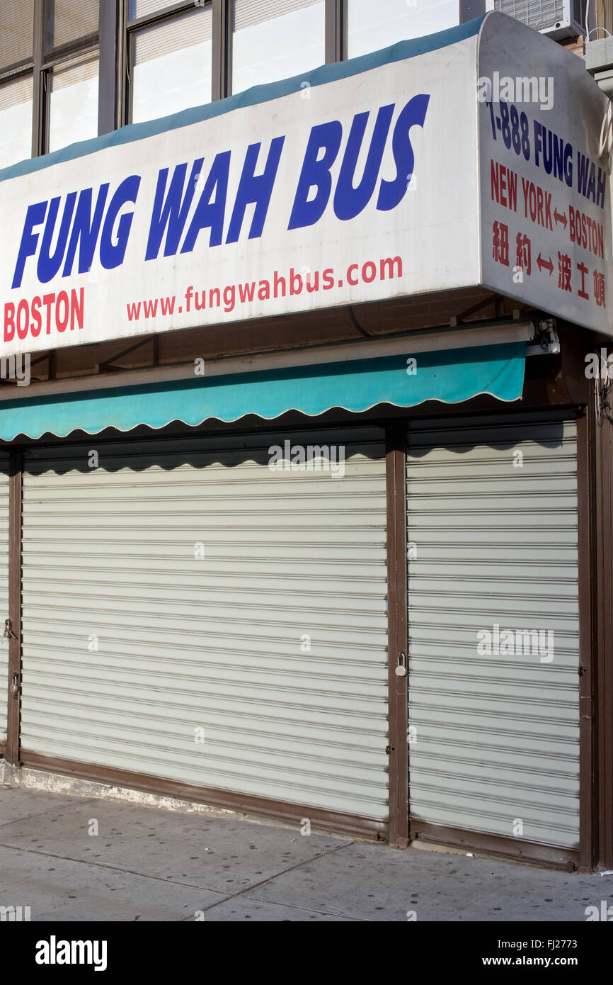 Fung Wah Bus signage at the shuttered Fung Wah storefront in the Lower East Side of New York, NY, USA. Stock Photo
