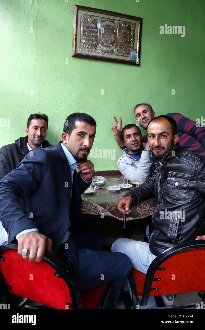 Group of men at café in Dogubayazit, Eastern Turkey Stock Photo