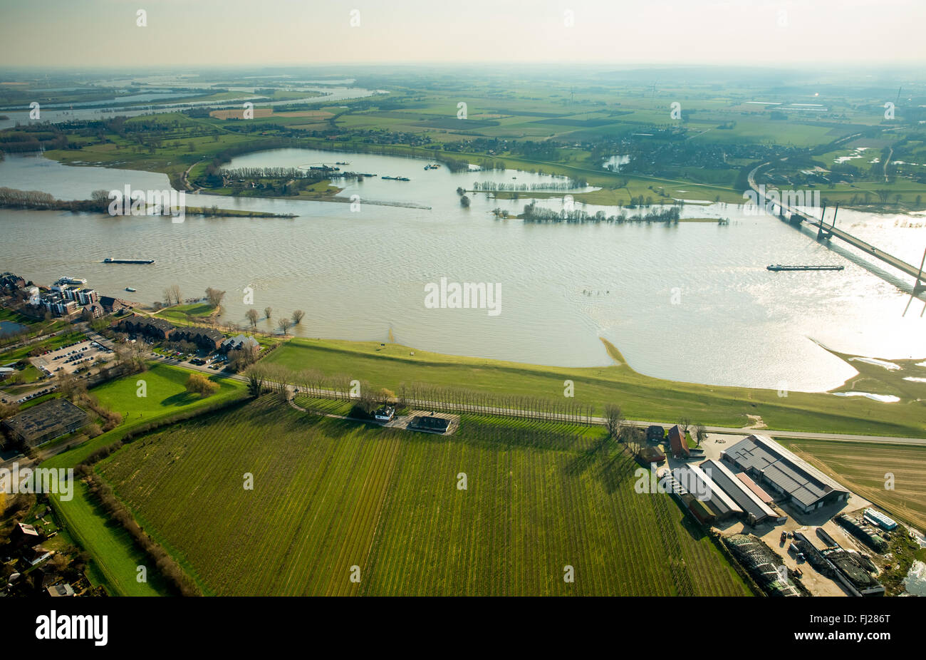Aerial view, Rhine at Rees, cable-stayed bridge, view of Kalkar on the Rhine to the downtown Rees with ship, Rees, Rhine, inland Stock Photo