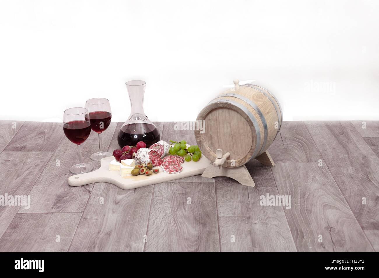 Still life with red wine and excellent food Stock Photo - Alamy