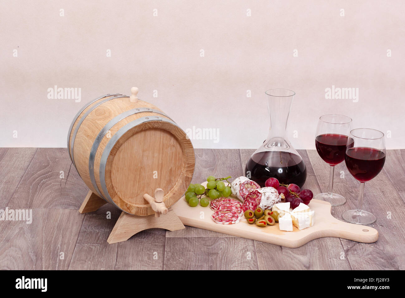 Still life with red wine and excellent food Stock Photo - Alamy
