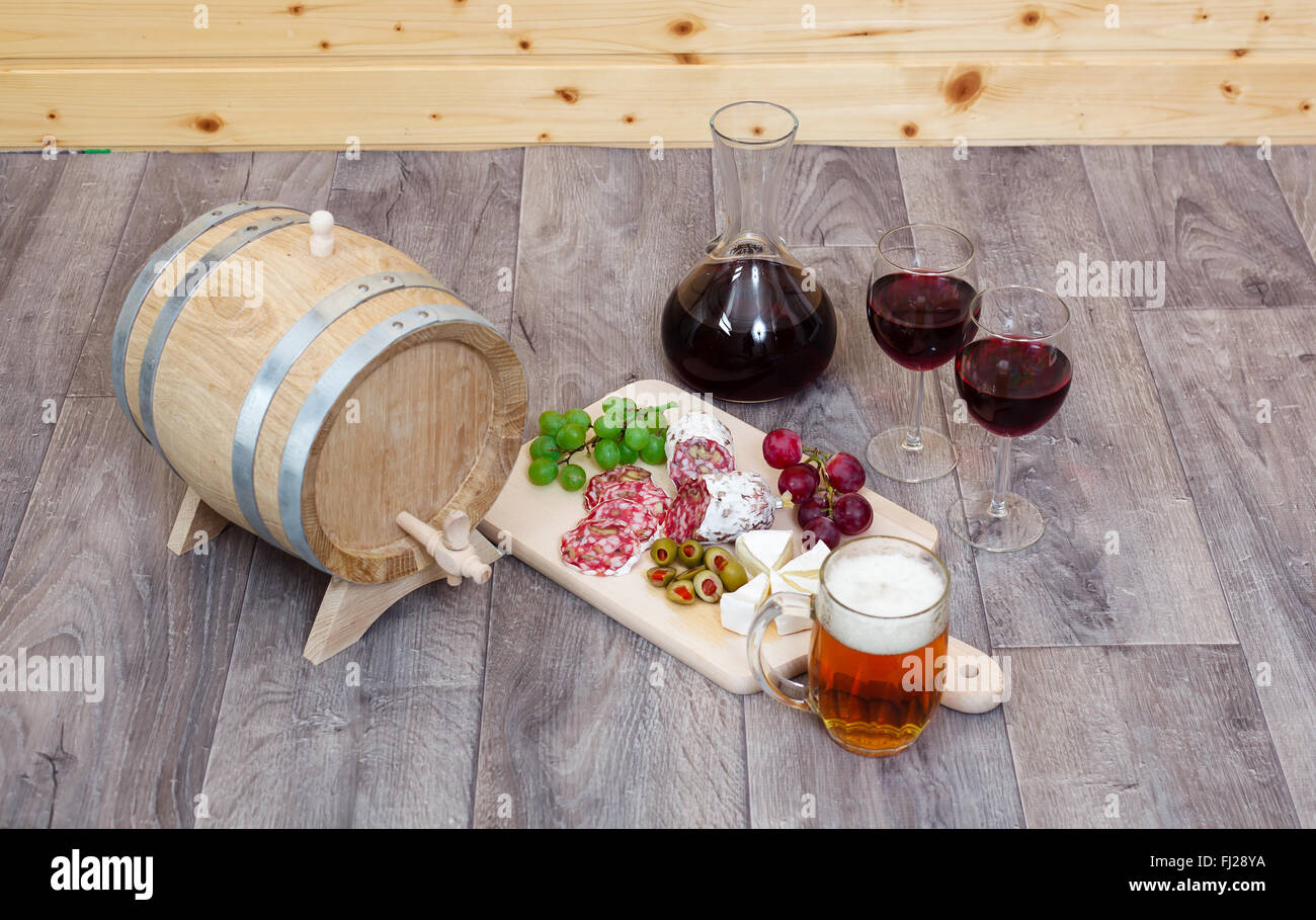 Still life with red wine and excellent food Stock Photo - Alamy