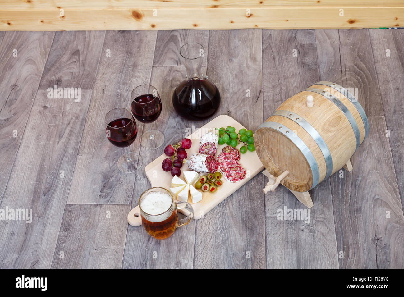 Still life with red wine and excellent food Stock Photo - Alamy