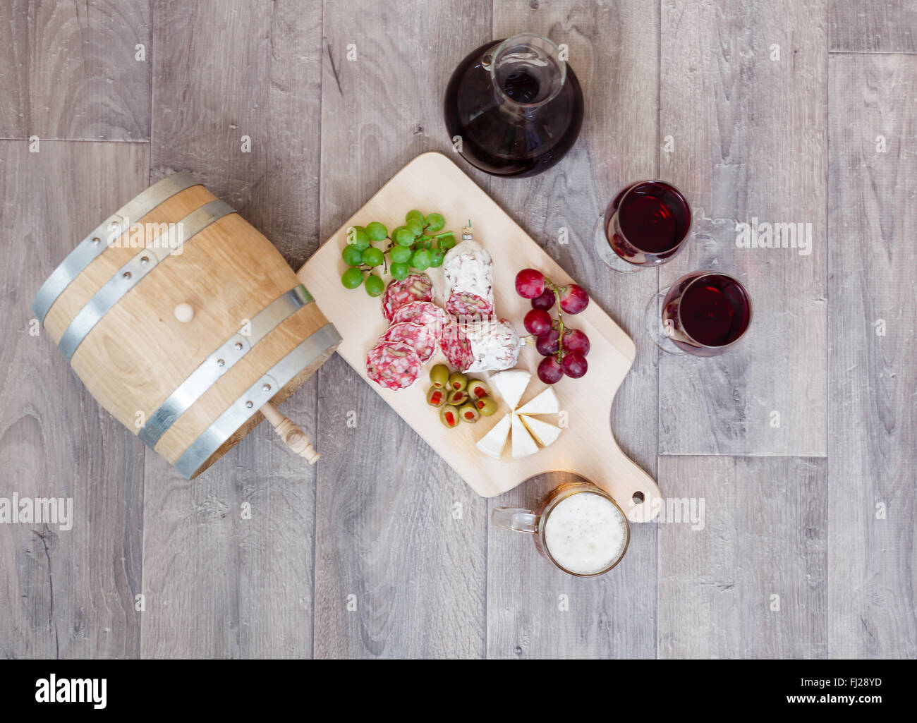 Still life with red wine and excellent food Stock Photo - Alamy