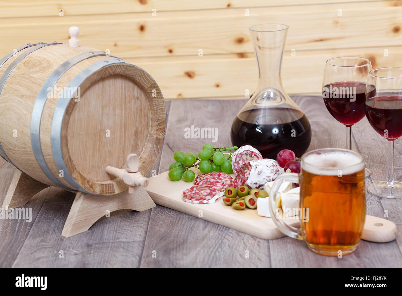Still life with red wine and excellent food Stock Photo - Alamy