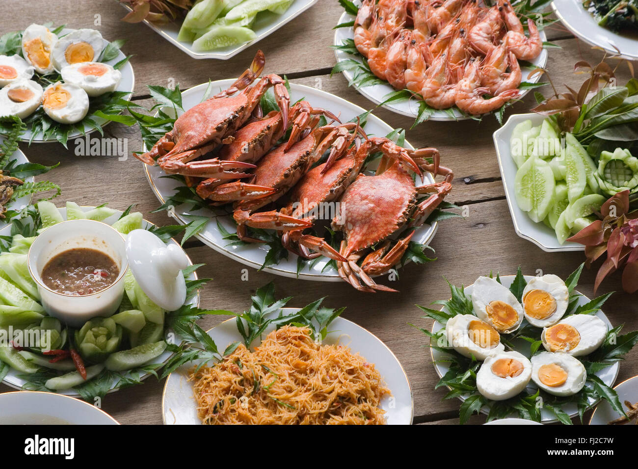 A feast of locally harvested crab, shrimp, wild and domestic vegetable are prepared for visitors in  Tung Nang Dam located on th Stock Photo