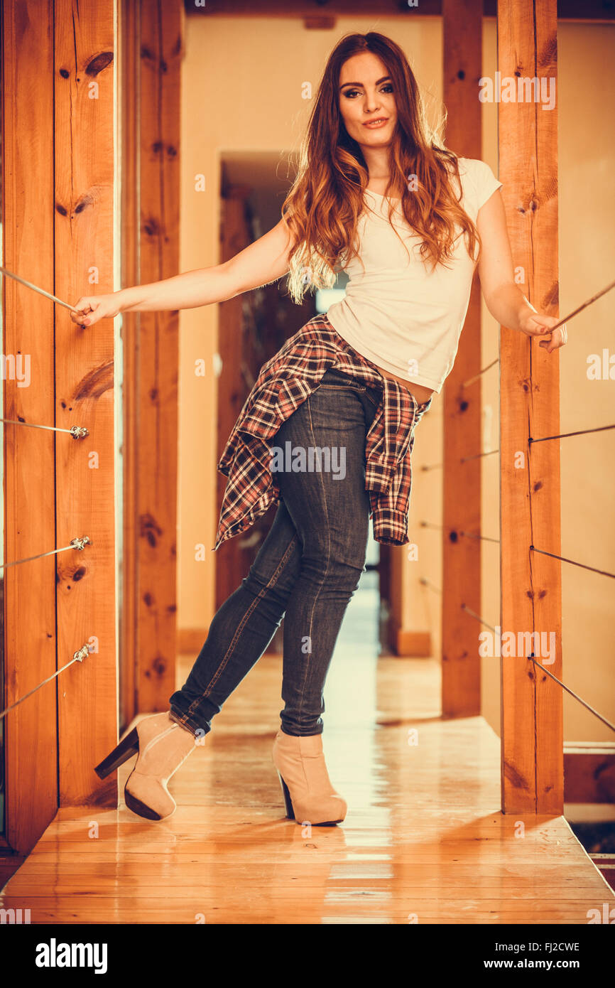 Young Woman Wearing High Heeled Boots and Posing in Studio · Free Stock  Photo