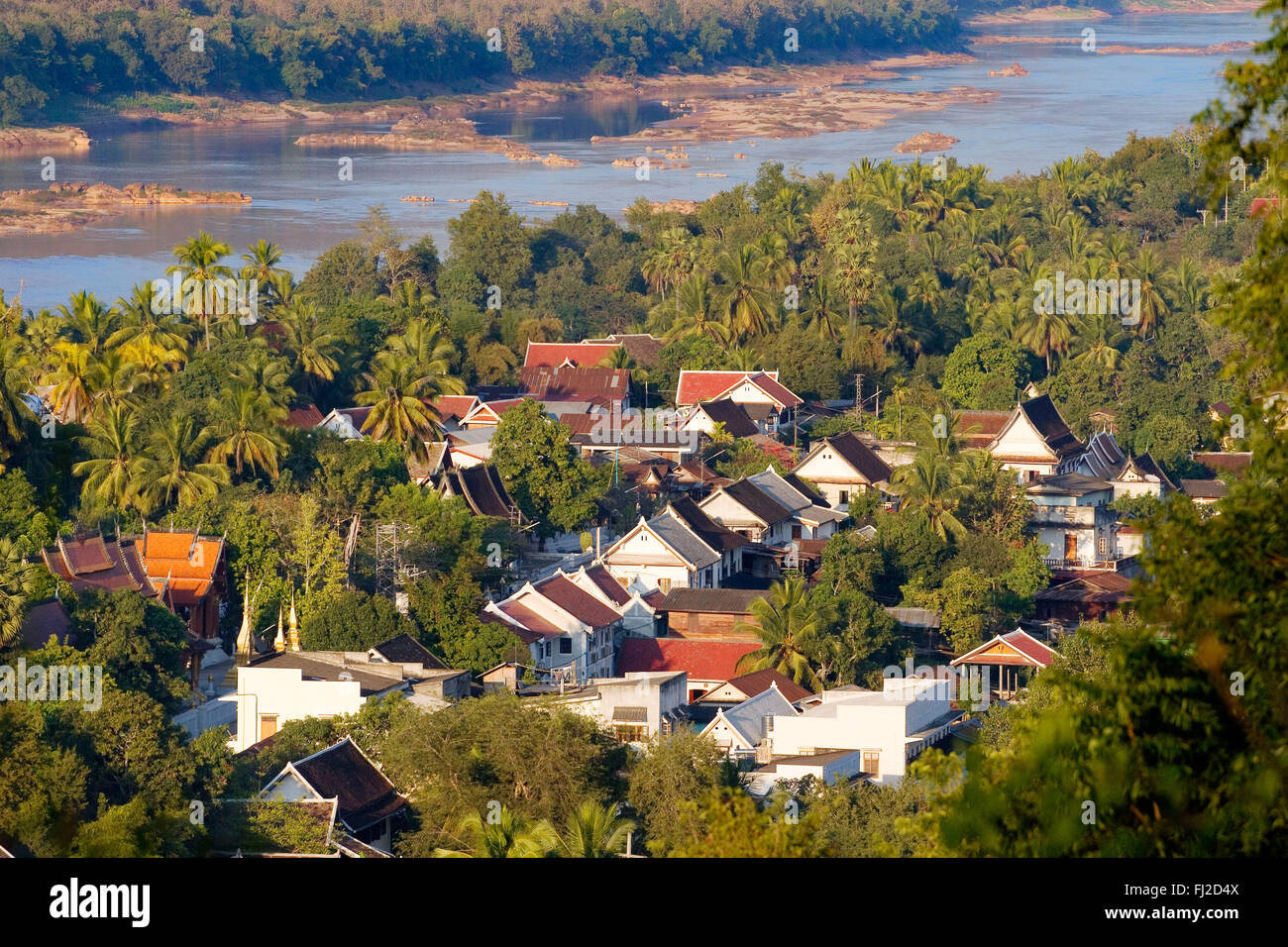 View of the Mekong River and the former French Provincial town of LUANG PROBANG from Phu Si hill - LAOS Stock Photo