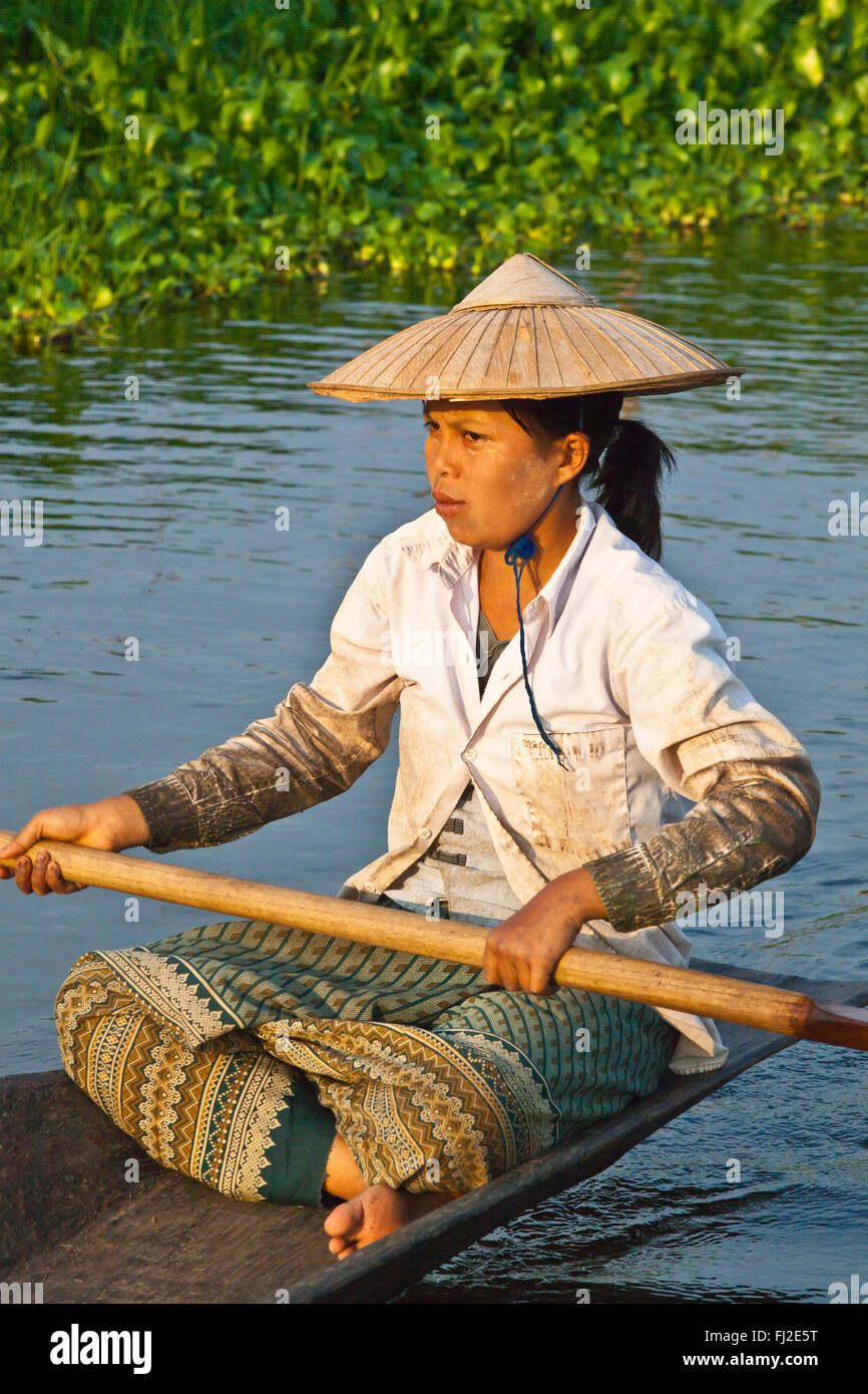 Hand made WOODEN BOATS are the main form of transportation on INLE LAKE - MYANMAR Stock Photo