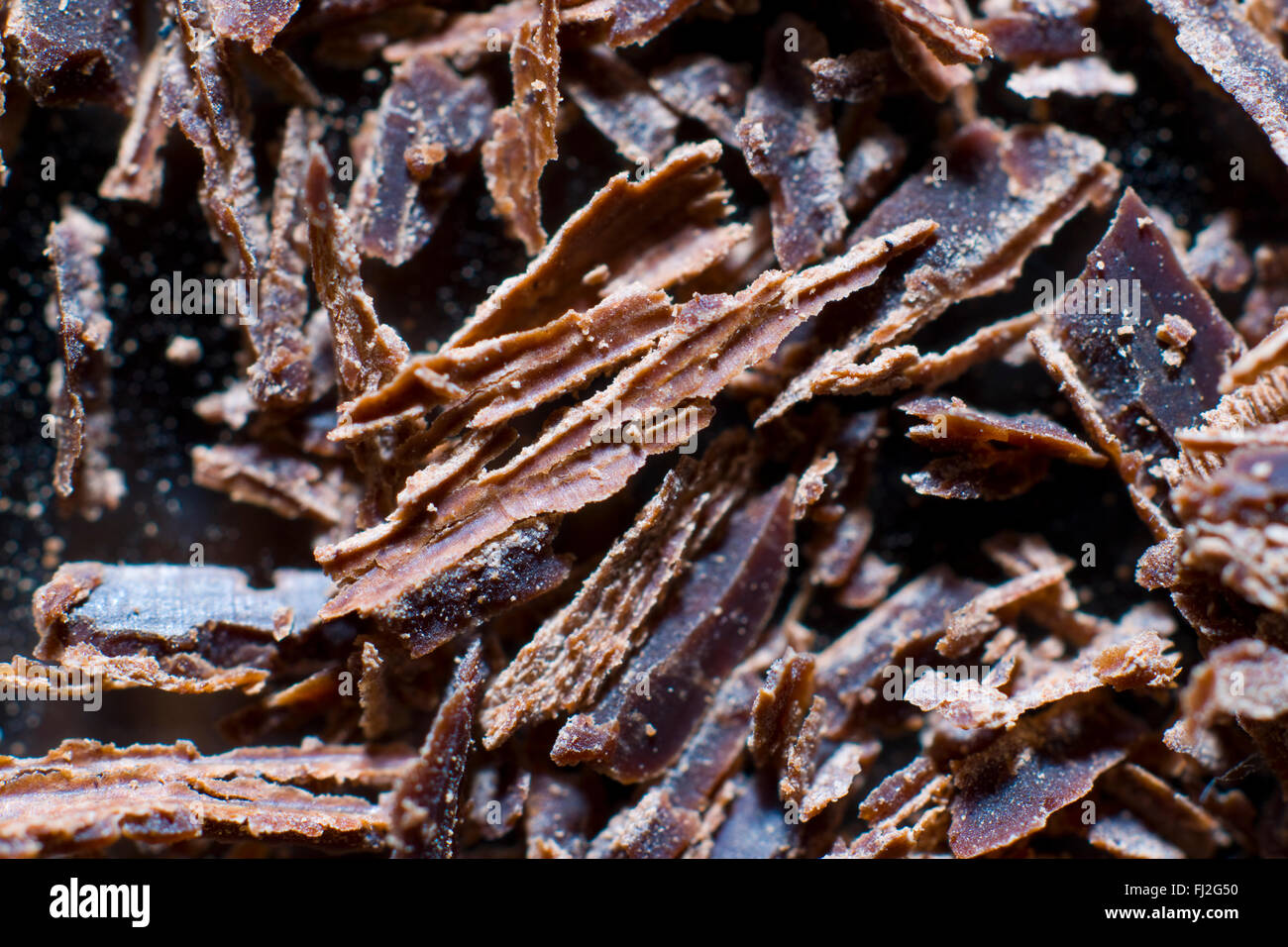 extreme close up of baking chocolate flakes baking cacoa brown Stock Photo