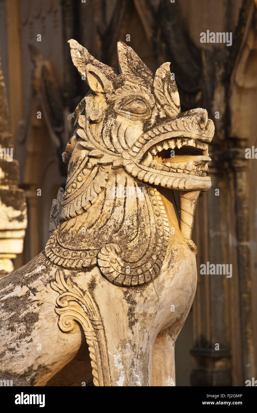 A CHINTHE is a mystical half lion half dragon guardian at ANANDA PAYA or TEMPLE which was built by King Kyanzittha around 1100 - Stock Photo