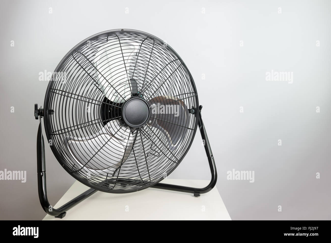 black metal ventilation fan on white background Stock Photo